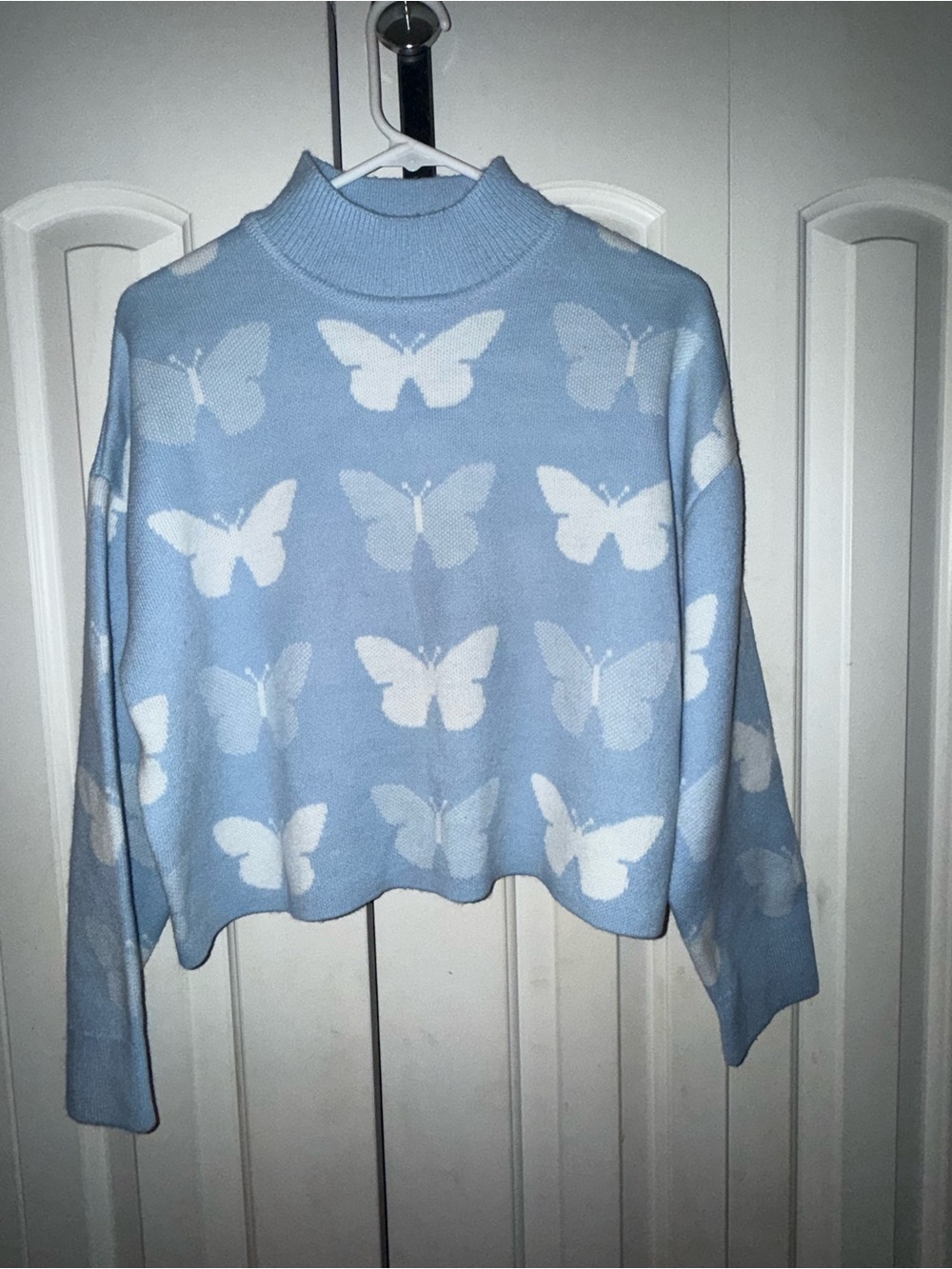 Divided Light Blue Butterfly Turtleneck Sweater